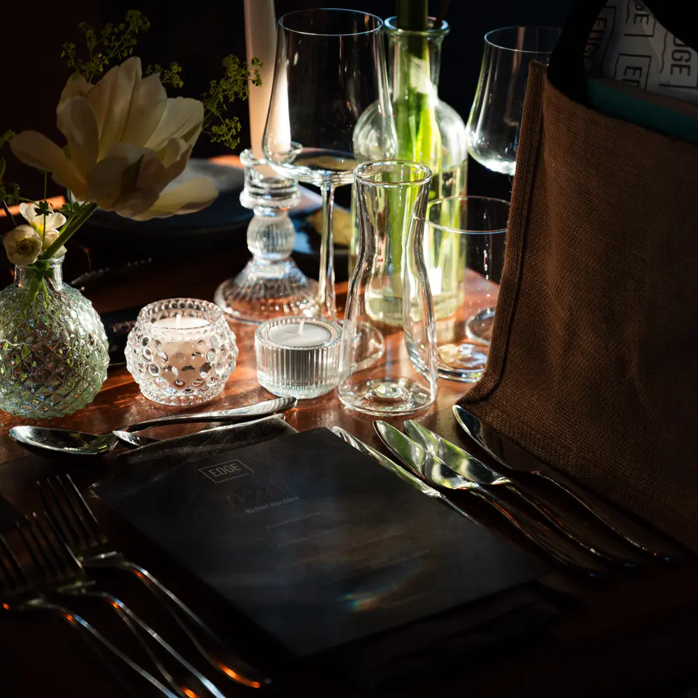 A dark, moody plated dish at dinner