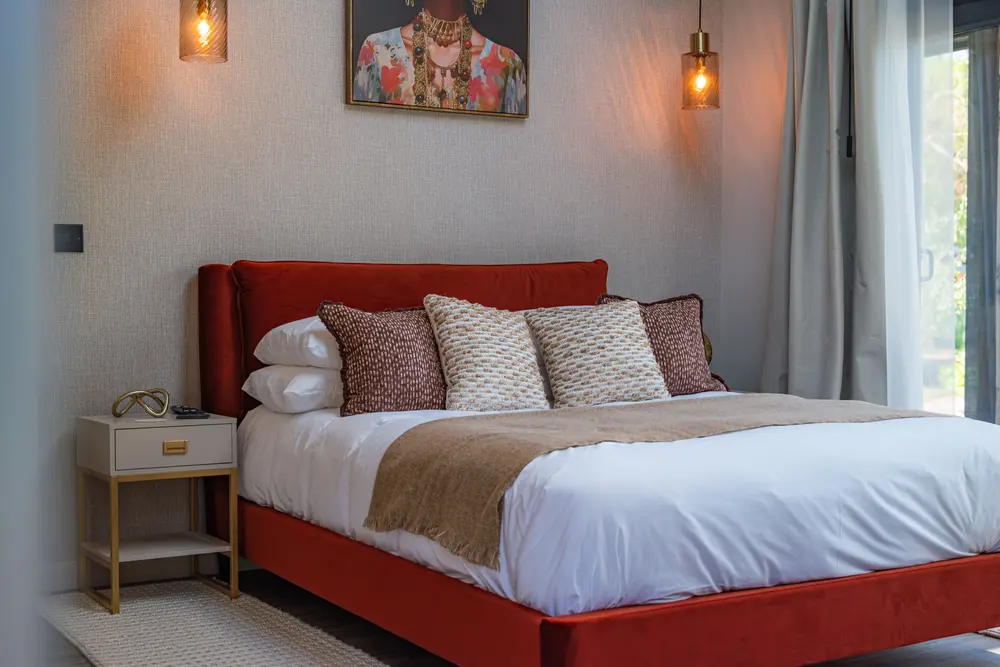 A calm bedroom with crisp white bedding